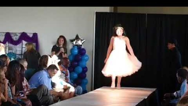 'Journie walking the runway during DFW Teen Fashion Week'