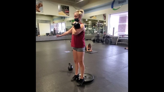 'Single Arm Kettlebell Front Rack Cyclist Squat'