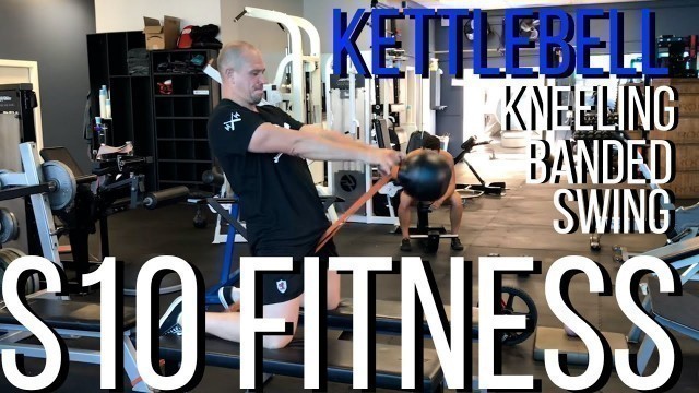 'S10 Fitness kneeling banded kettlebell swing with coach Chris Daly'