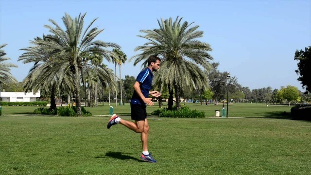 'Football / soccer exercise: heel flick / butt kicks drill'